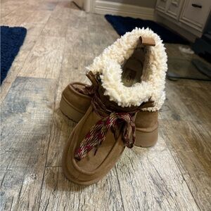 Tan, fur lined boots. Worn once!